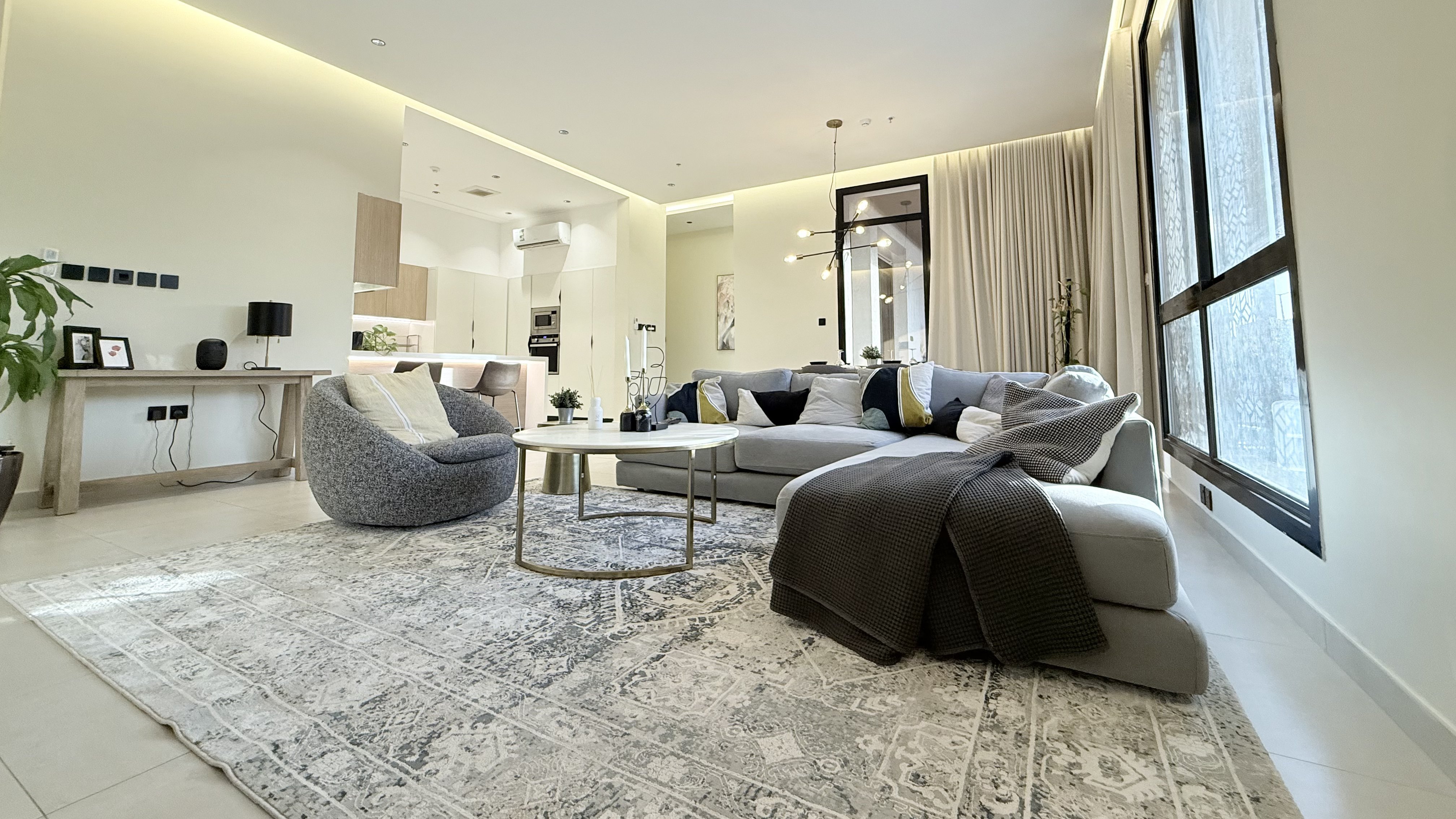 Contemporary Chic Apartment with Balcony — living area
